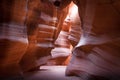 Stunning shot of a slot canyon with a light ray in Lower Antelope Canyon in Arizona Royalty Free Stock Photo