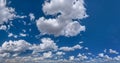 Stunning skyscape with cumulus clouds. Cloudy sky panorama