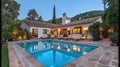 Stunning Spanish villa with pool at dusk Royalty Free Stock Photo
