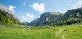 stunning spring landscape with green pasture, Eng tyrol, with heart shaped cloud Royalty Free Stock Photo