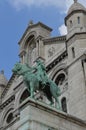 Stunning statue on top of the wall of The Basilica of the Sacred Heart in Paris