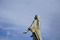 Stone angel statue with missing wings on historic cemetery Royalty Free Stock Photo