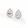 Stunning Stud Earrings With Halo Design And Drop-shaped Diamonds Royalty Free Stock Photo