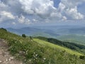 Poland - Bieszczady - Beautiful view of the low mountains and white clouds from the stone path Royalty Free Stock Photo