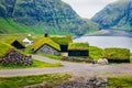Stunning summer scene of Saksun village with typical turf-top houses and Saksunar Kirkja, Faroe Islands. Wonderful morning view of