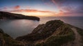 Stunning Summer sunrise over calm ocean landscape