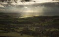 Stunning sun beams over Big Moor in Peak District National Park Royalty Free Stock Photo