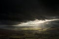 Stunning sun beams over Big Moor in Peak District National Park Royalty Free Stock Photo