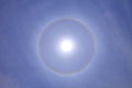 Beautiful and stunning sun halo with deep blue sky on sunny day Royalty Free Stock Photo