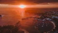 Stunning sunrise with boats at Ulladulla Harbour on the South Coast of NSW, Australia