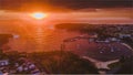 Stunning sunrise with boats at Ulladulla Harbour on the South Coast of NSW, Australia