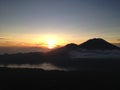 Stunning sunrise on Mount Batur, active volcano with Lake Batur on the island of Bali, Indonesia Royalty Free Stock Photo