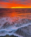 Stunning sunrise over ocean as sun rises in morning Royalty Free Stock Photo