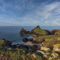 Beauitful sunrise and sunset landscape image of Kynance Cove in Cornwall England with colourful sky Royalty Free Stock Photo