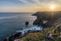 Beauitful sunrise and sunset landscape image of Kynance Cove in Cornwall England with colourful sky Royalty Free Stock Photo