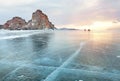 Stunning sunset above the frozen surface of the lake Baikal on the Olkhon iceland