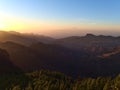 Stunning sunset above the rough mountains of island Gran Canaria, Canary Islands, Spain with colorful dramatic sky. Royalty Free Stock Photo