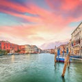 Stunning sunset and evening cityscape of Venice with famous Canal Grande and Rialto Bridge Royalty Free Stock Photo