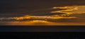 Stunning sunset on a gloomy winter afternoon, Kapiti Coast in New Zealand, Tasman Sea