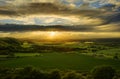 Stunning sunset over countryside landscape