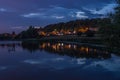 A Late Evening Photo Of A Village Reflected In Water Royalty Free Stock Photo