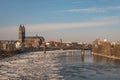 Stunning sunset over Magdeburg downtown in Winter with ice drift in Elbe river, Germany, sunny day, blue clean sky Royalty Free Stock Photo