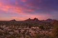 Stunning sunset over Phoenix, Arizona, Papago Park in foreground.