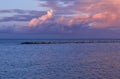 Stunning sunset over sea and rocks. Bari seafront coastline. Royalty Free Stock Photo