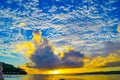 Stunning sunset in Port Vila, Vanuatu. Clouds, yellow sunset and blue sky. Royalty Free Stock Photo