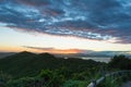 The stunning sunset view on montains hills and ocean in Byron Bay, Australia Royalty Free Stock Photo