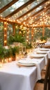 A stunning table with candles and greenery in a bright conservatory, ideal for dining Royalty Free Stock Photo
