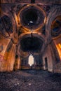 Stunning tall ruin on a church collapsing shot from interior wit Royalty Free Stock Photo