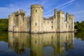 14th century Bodium castle surrounded by a moat in the County of Sussex in England. Royalty Free Stock Photo