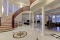 Stunning two story entry foyer with marble mosaic tiled floor Royalty Free Stock Photo