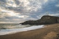 Stunning Twr Mawr lighthouse landscape from beach with dramatic