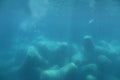 Stunning underwater scene of the ocean floor with rocks