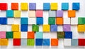 A stunning vibrant abstract composition featuring a dense array of multicolored geometric wooden cubes meticulously arranged in a Royalty Free Stock Photo