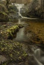 Stunning vibrant landscape image of Aira Force Upper Falls in Lake District during colorful Autumn showing Royalty Free Stock Photo