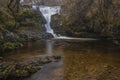 Stunning vibrant landscape image of Aira Force Upper Falls in Lake District during colorful Autumn showing Royalty Free Stock Photo