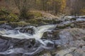 Stunning vibrant landscape image of Aira Force Upper Falls in Lake District during colorful Autumn showing Royalty Free Stock Photo