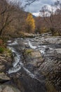 Stunning vibrant landscape image of Aira Force Upper Falls in Lake District during colorful Autumn showing Royalty Free Stock Photo