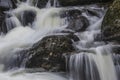 Stunning vibrant landscape image of Aira Force Upper Falls in Lake District during colorful Autumn showing Royalty Free Stock Photo