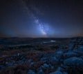 Stunning vibrant Milky Way composite image overBeautiful Autumn sunset landscape image of view from Leather Tor towards Burrator