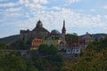 Stunning view of ancient Loket Castle with colorful buildings by summer sunny day. Bohemia, Sokolov, Karlovarsky Region