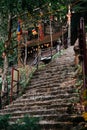 Asian Buddhist Temple Shrine with stairs leading up to temple at Yen Tu Mountain Royalty Free Stock Photo