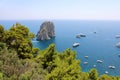 Stunning view of Capri island in a beautiful summer day with Faraglioni rocks Capri, Italy