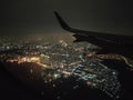 Stunning View of City Light from The Airplane at Night Fight Royalty Free Stock Photo