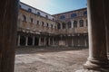 A stunning view of the classical architecture and grandeur of an old building's courtyard in Venice