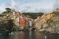 Stunning view of colorful Riomaggiore village at sunset in Cinque Terre, Italy Royalty Free Stock Photo