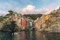 Stunning view of colorful Riomaggiore village at sunset in Cinque Terre, Italy Royalty Free Stock Photo